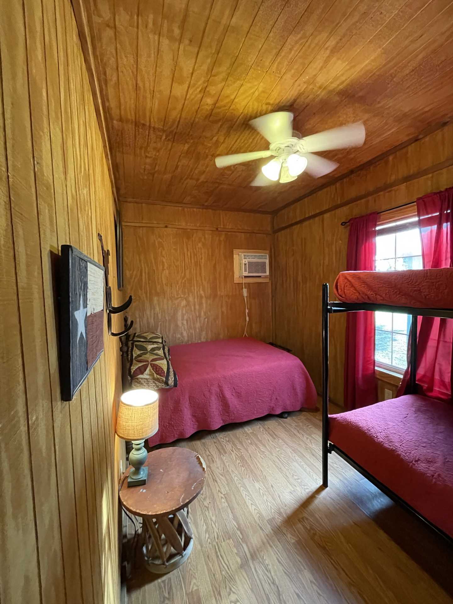                                                The Lone Star Cabin features two bedrooms with double and twin bunk beds, with peaceful sleeping arrangements for up to eight guests.