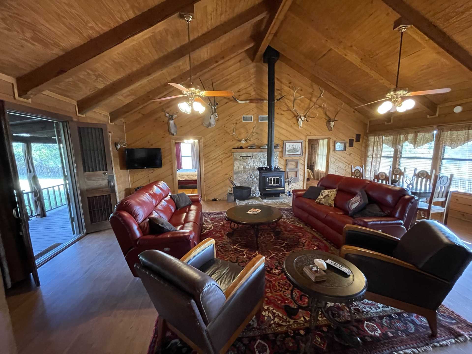                                                 High ceilings, golden woodwork, and tasteful furnishings create a restful living space for everyone at the Lodge.