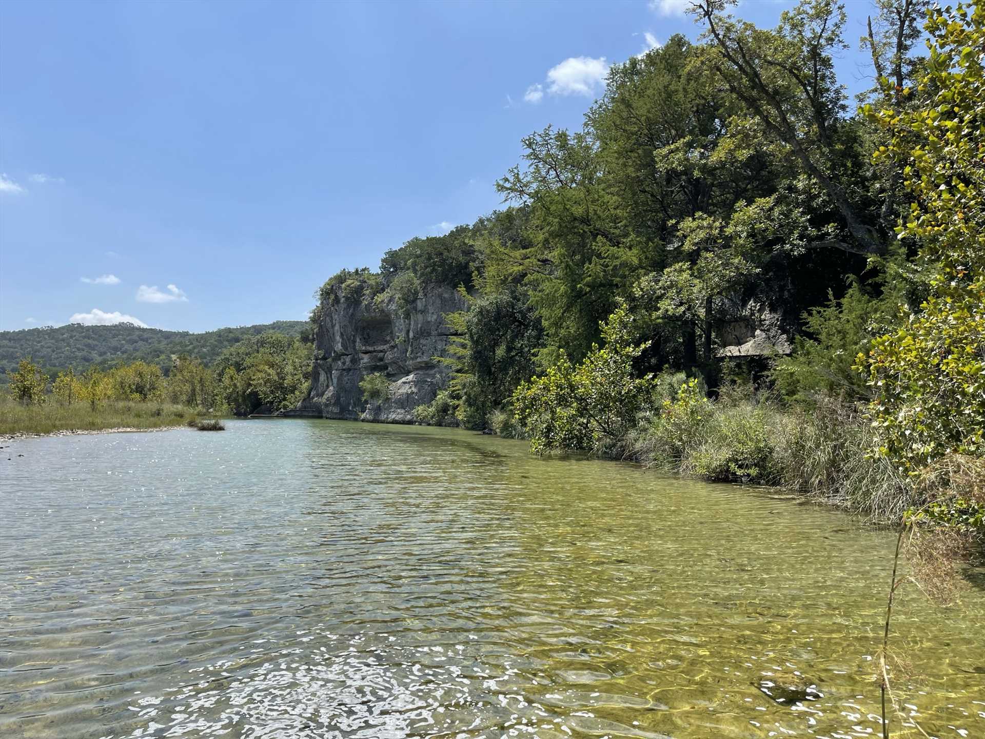                                                 This scenic stretch of the Dry Frio has been dammed to create a swimming hole just for our guests-and check out those amazing mountain views!