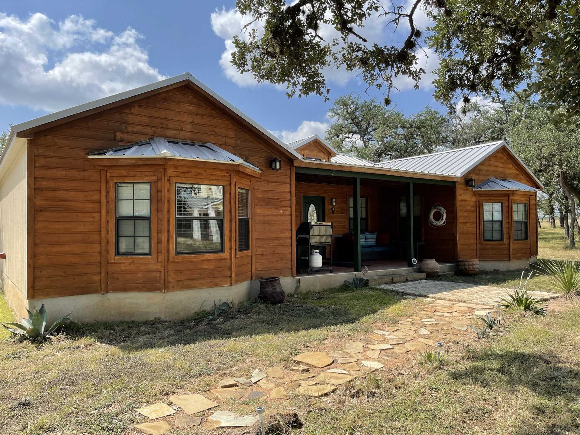                                                 Your portal to Hill Country beauty and well-earned relaxation: the Bandera Ridge Cabin!