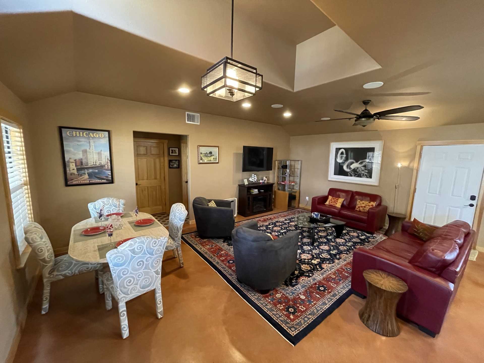                                                 The inviting living area (and neighboring dining area) includes a firestick-enhanced smart TV, Wifi service, and is kept comfy with central air and heat.