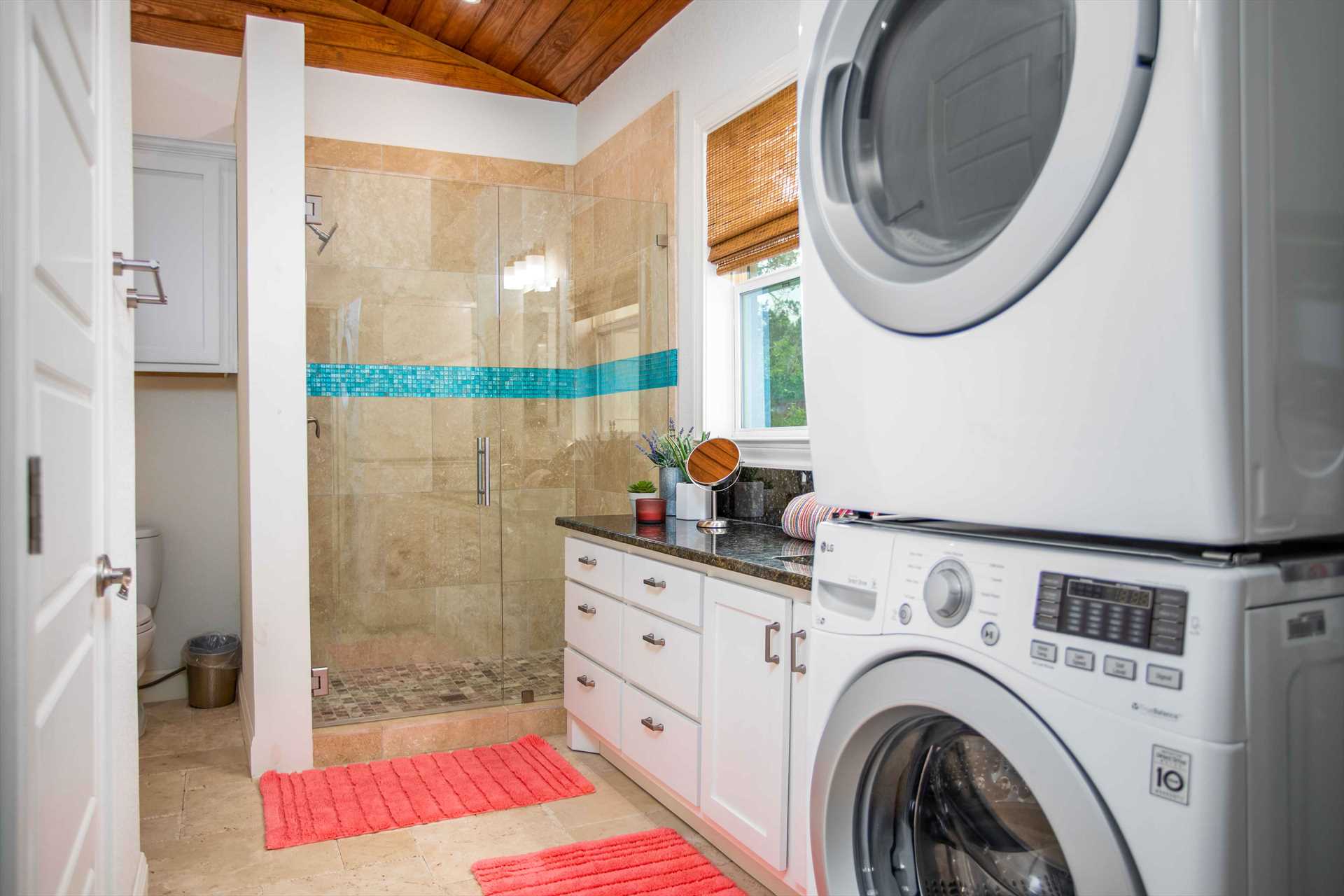                                                 Adjacent to the full bath is a utility room with a convenient washer and dryer!