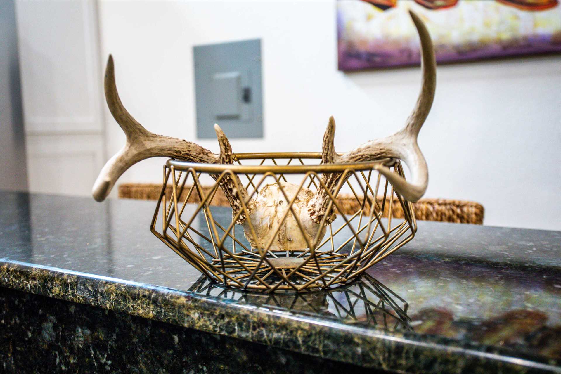                                                 Take a closer look! There's Western decor throughout the guest home, and even the counter tops reflect sparks of color!