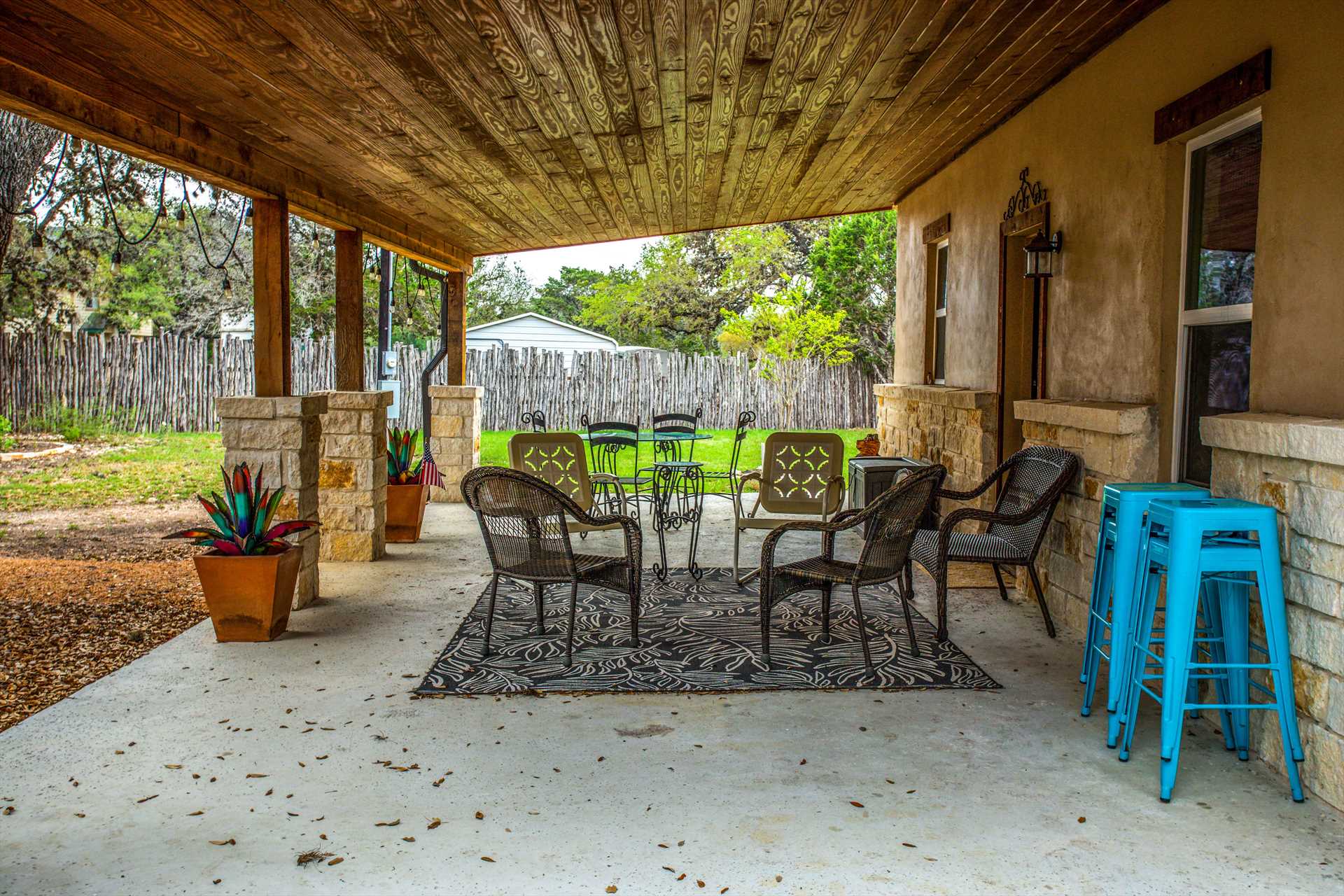                                                 Relax and converse in the fresh country breezes on the comfy outdoor furniture on the shaded patio!