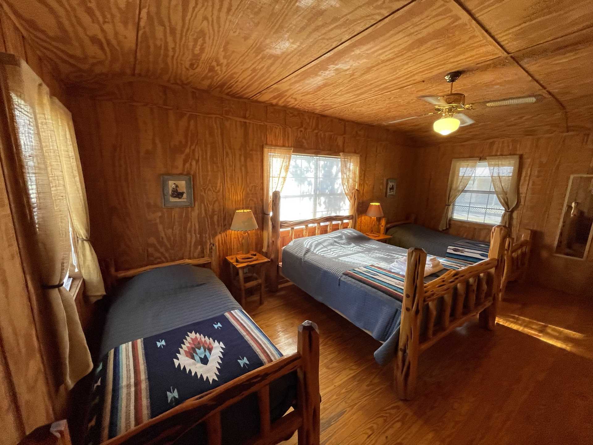                                                 With a queen and three twin-sized beds here, there's sweet slumber accommodations for up to five of your folks.