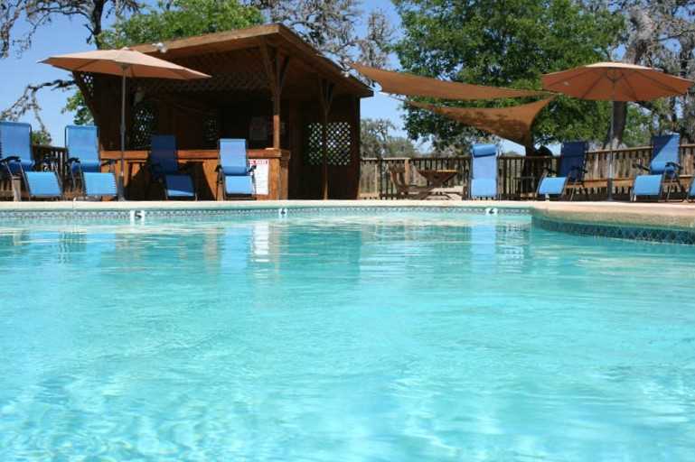                                                 Texas summers can be toasty, that's for sure! Take the edge off the heat in the crystal-clear pool.