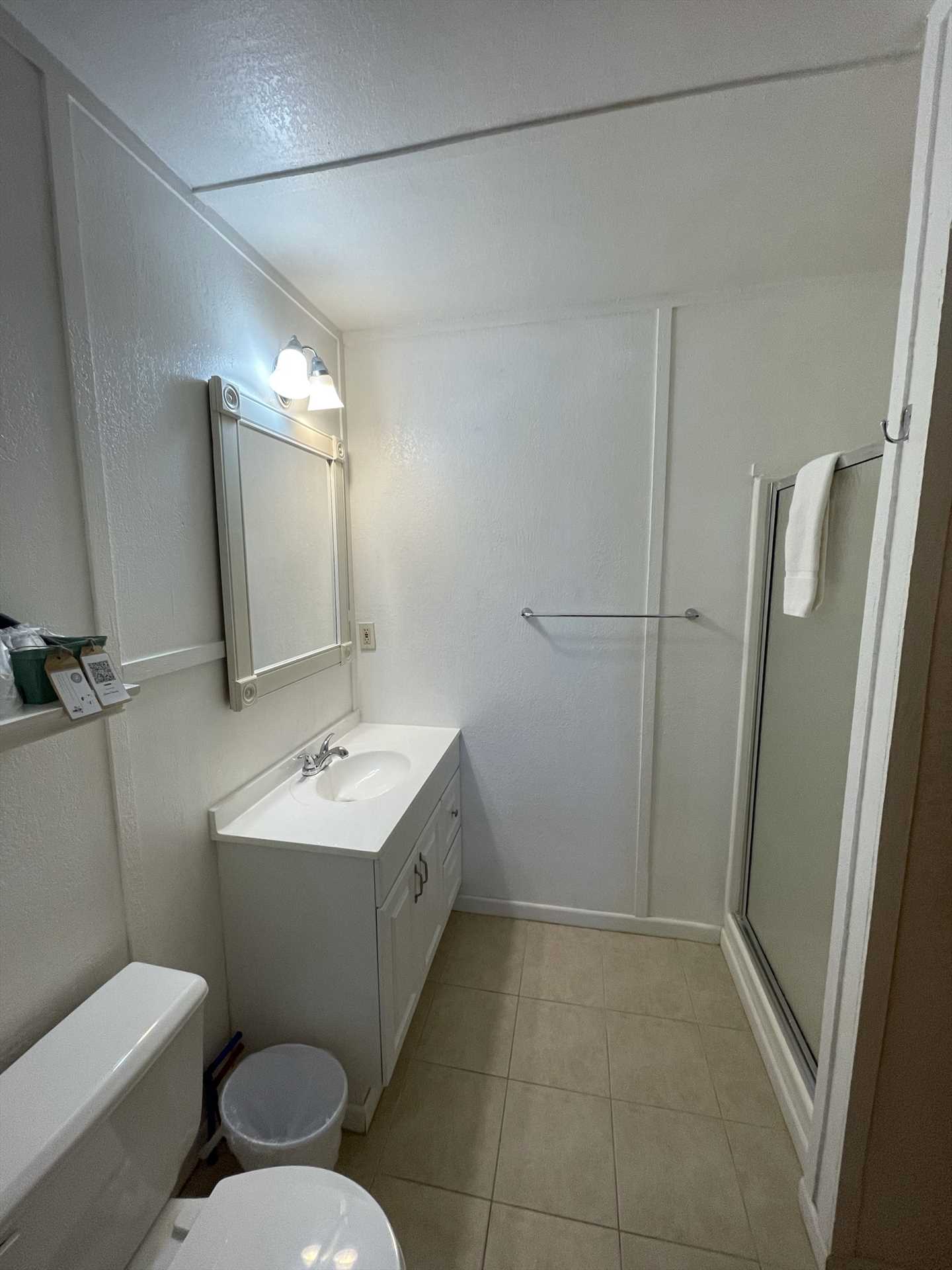                                                 You'll find a shower stall and clean linens on hand in the immaculate full bath.