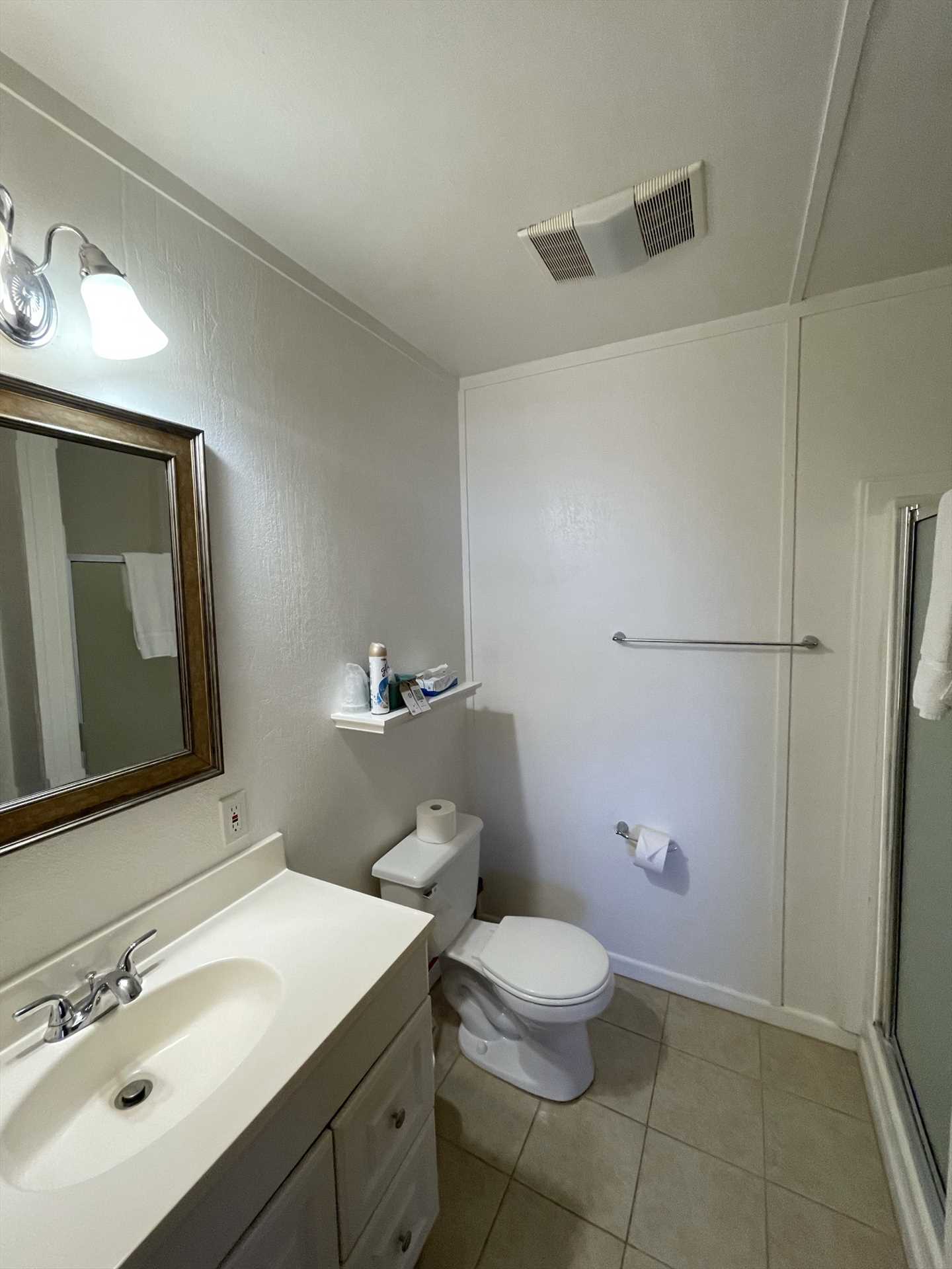                                                 The clean full bath includes a shower stall, and fresh lines are provided. Your whole interior space is kept comfy with box AC and heat, as well as a ceiling fan.