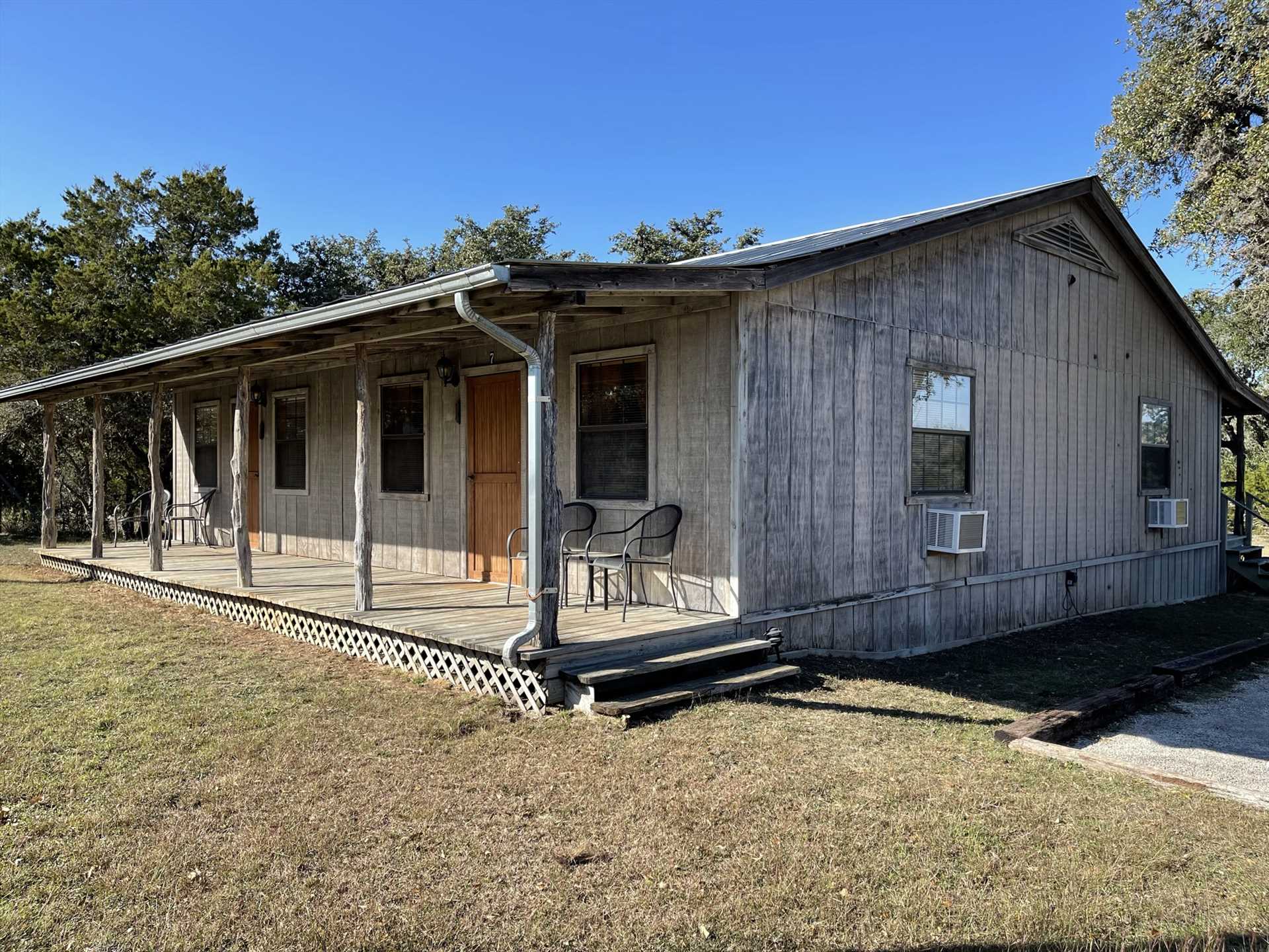                                                 The rugged wood construction of the Hackberry cabin is right at home in the Hill Country, and provides a perfect spot for your getaway!