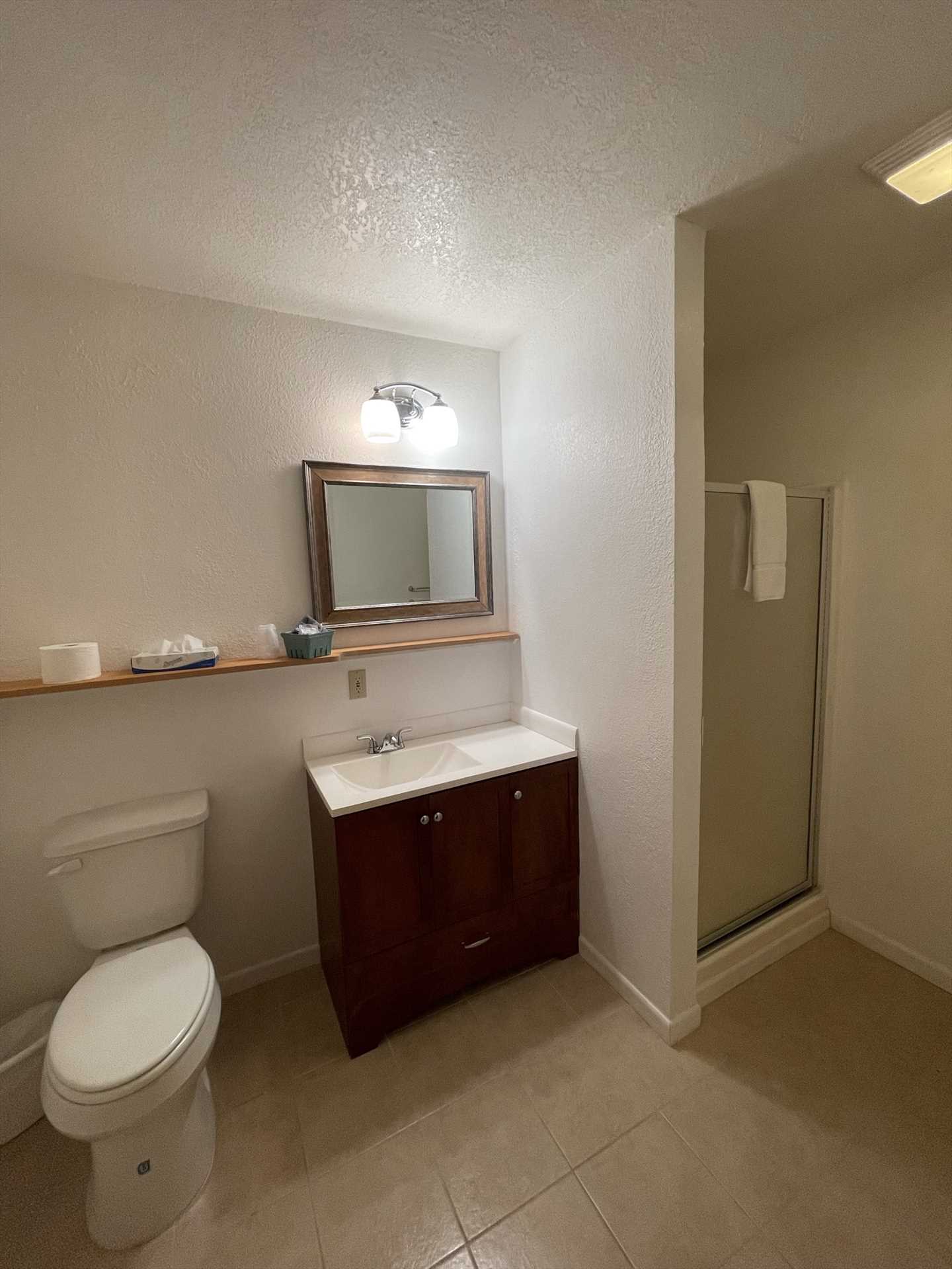                                                 A shower stall is installed in the clean full bath, and clean and soft bed and bath linens are provided for all during your stay!