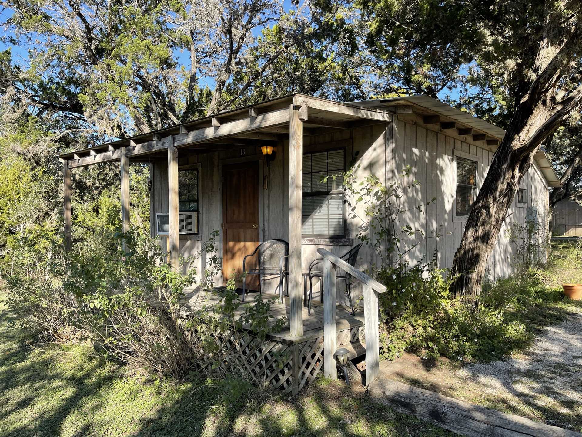                                                 Nestled in the trees, the Juniper Cabin is your private getaway spot in the gorgeous Hill Country!