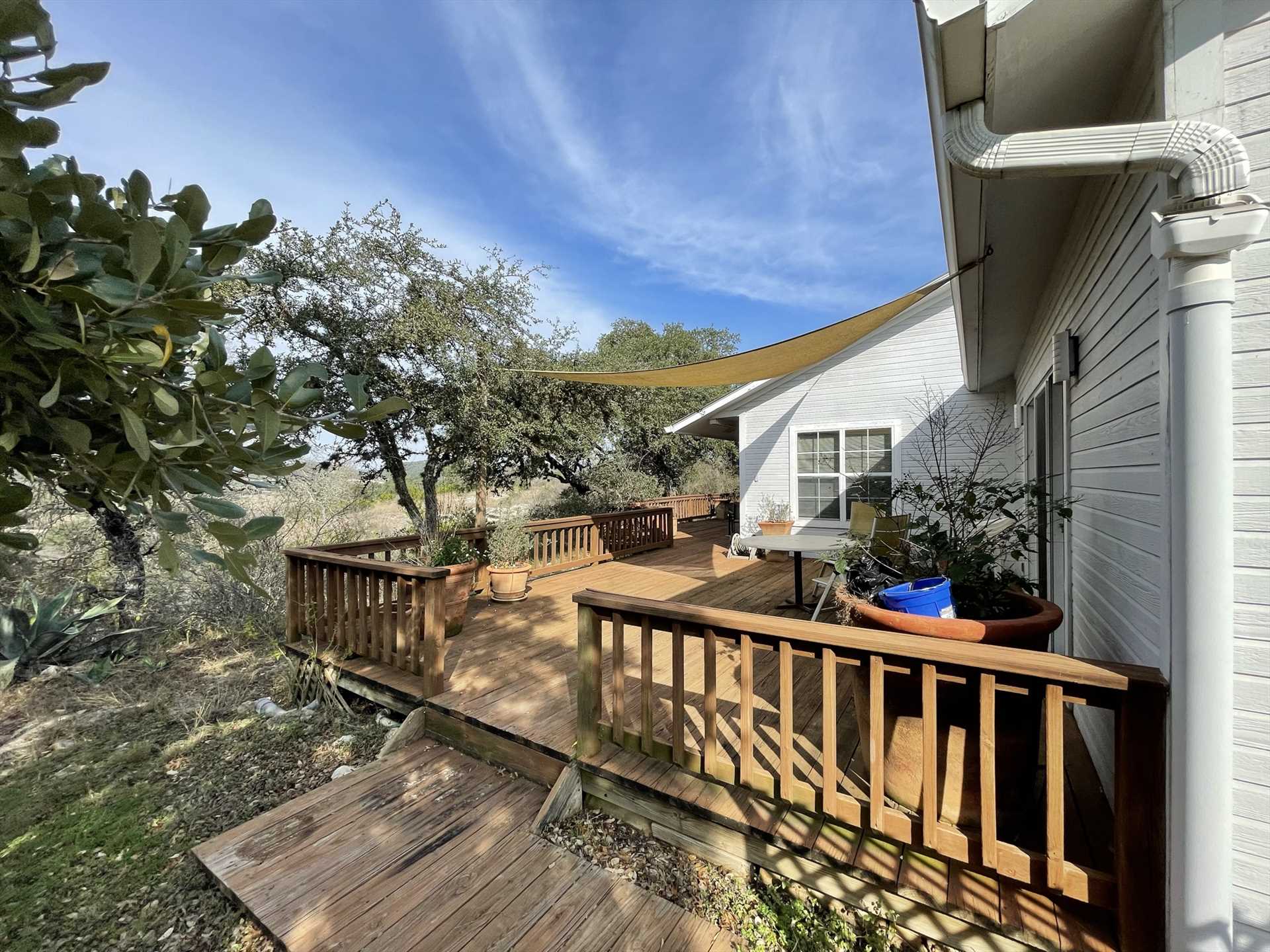                                                 A shady awning keeps the back deck comfy and cool, it's a great place to take in views of the ranch and the big and beautiful Hill Country.