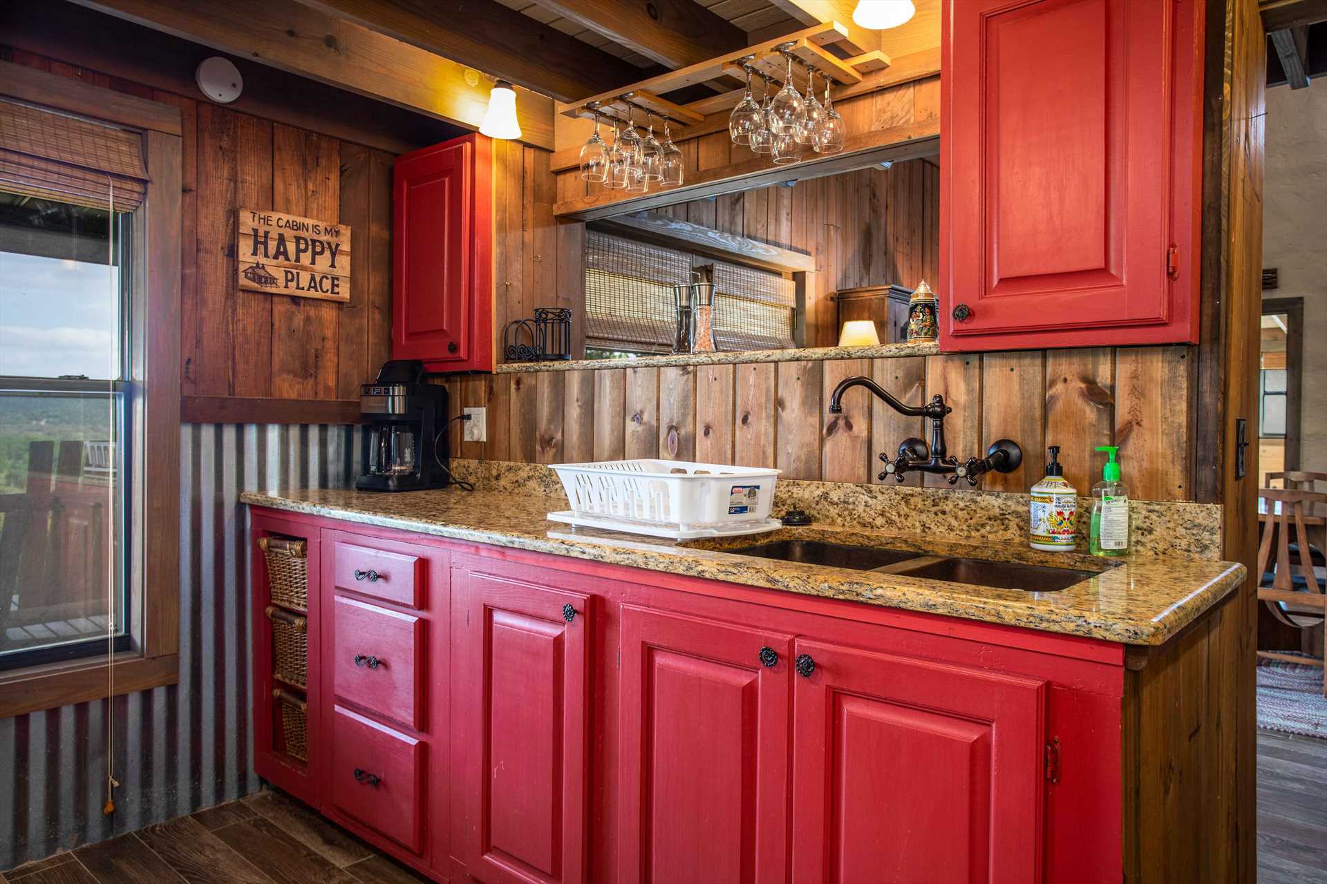                                                 This colorful county kitchen comes complete with all the cooking and serving ware, utensils, and glasses you'll need for your stay.