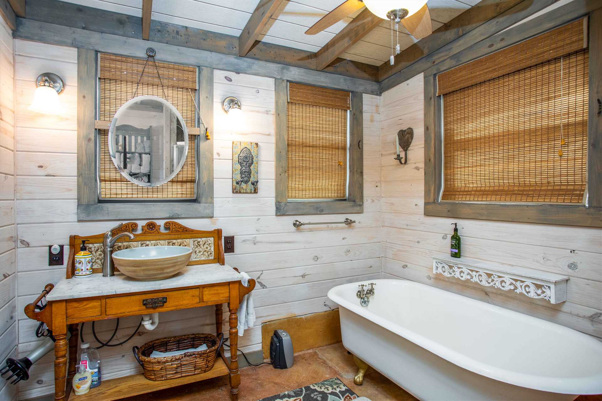                                                 The bowl-style vanity and other stylish decorative touches make even the bathrooms a pleasant part of your visit to Medina Mountain.