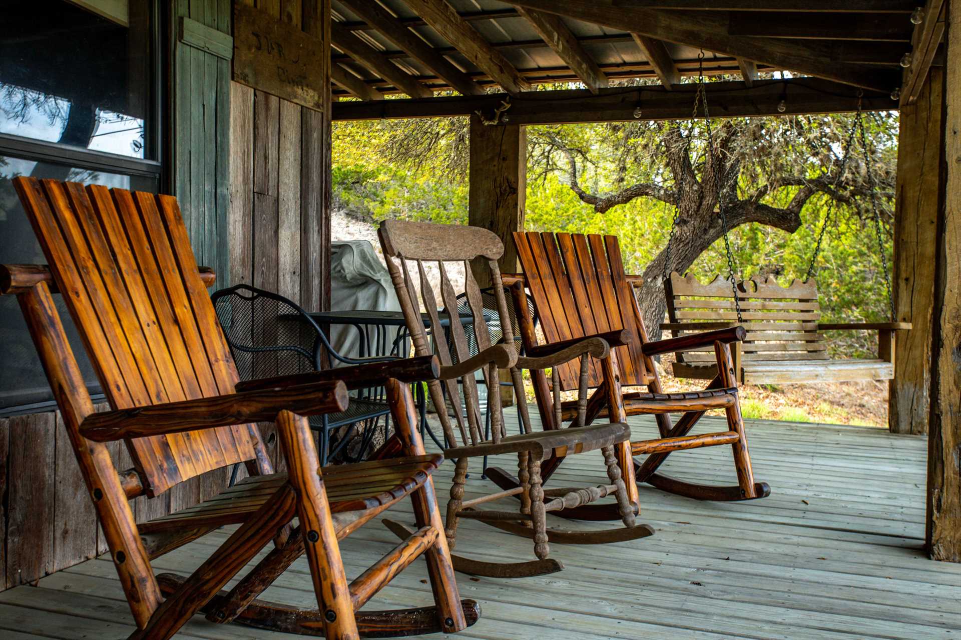                                                Sip your morning coffee, or your evening wine, on the porch as you rock away a few tranquil moments in the rocking chairs and porch swing!