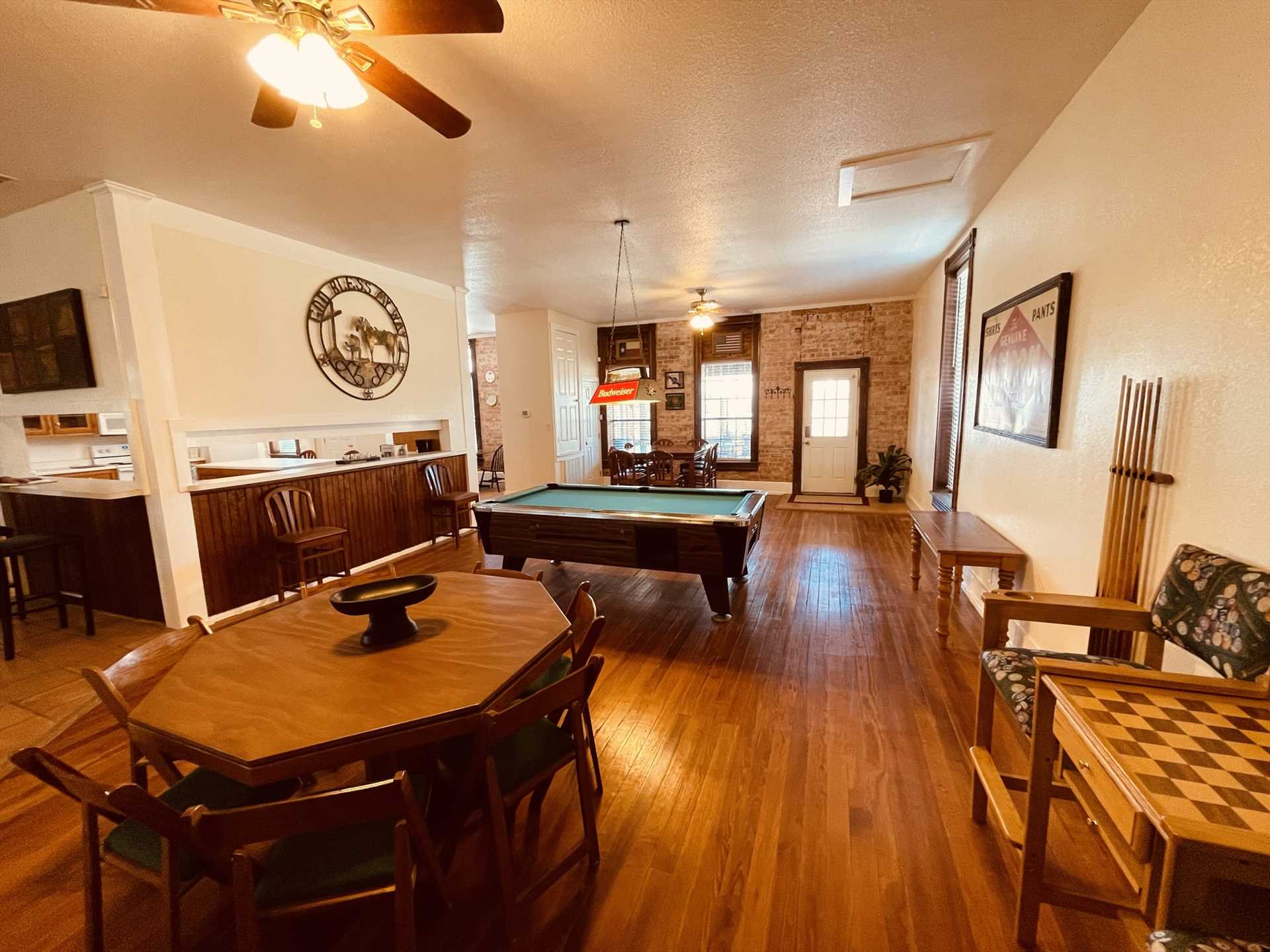                                                 Here's a great room for games of all kinds! From the pool table to more than one gaming table, there's tons of fun just waiting for you.