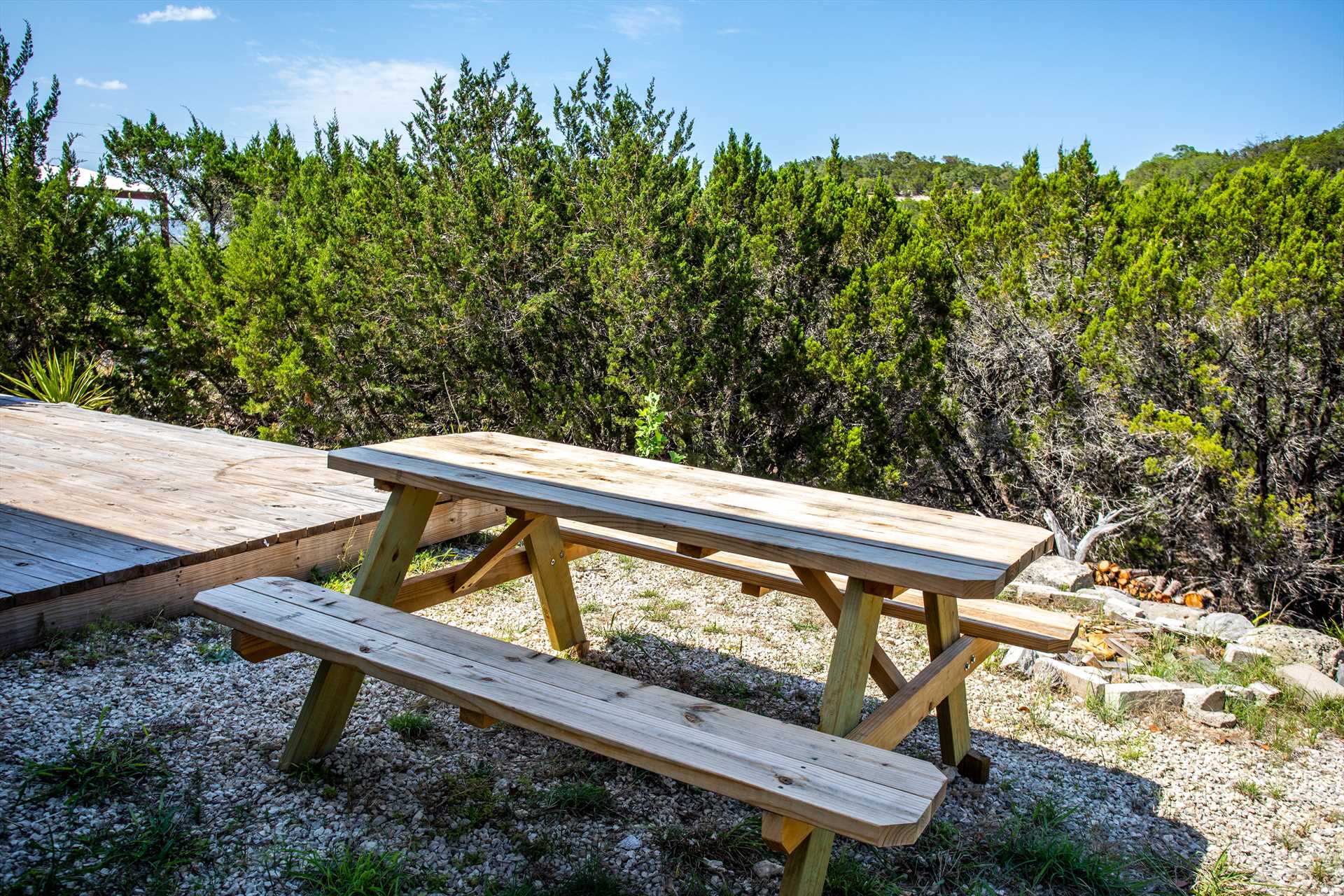                                                 Enjoy a meal-or just good company-around the picnic table! A BIG bonus is that amazing elevated view of the Hill Country!
