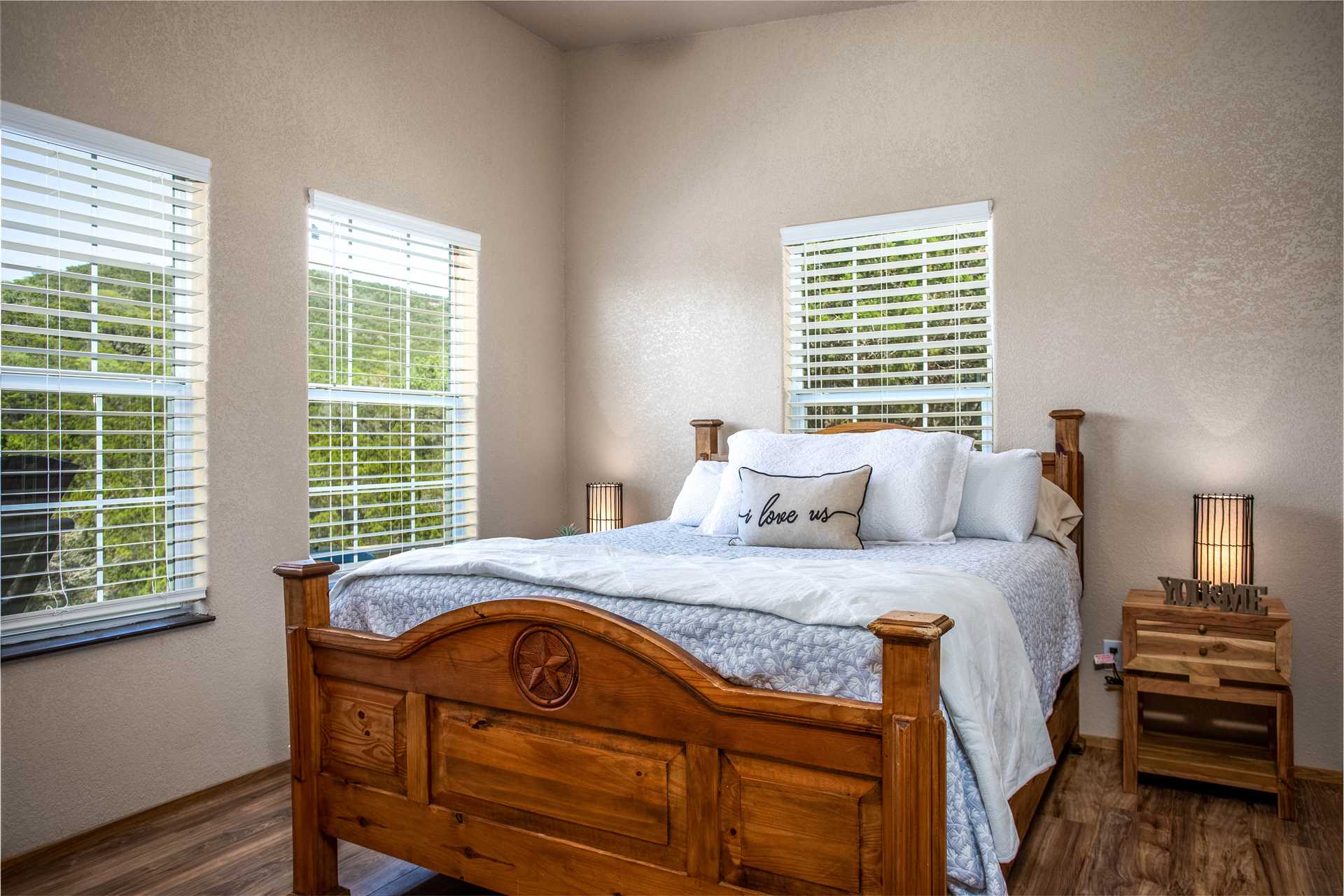                                                 Our guests love the warm and welcoming wood-framed queen-sized bed, and the bedroom windows that let in natural light, too!