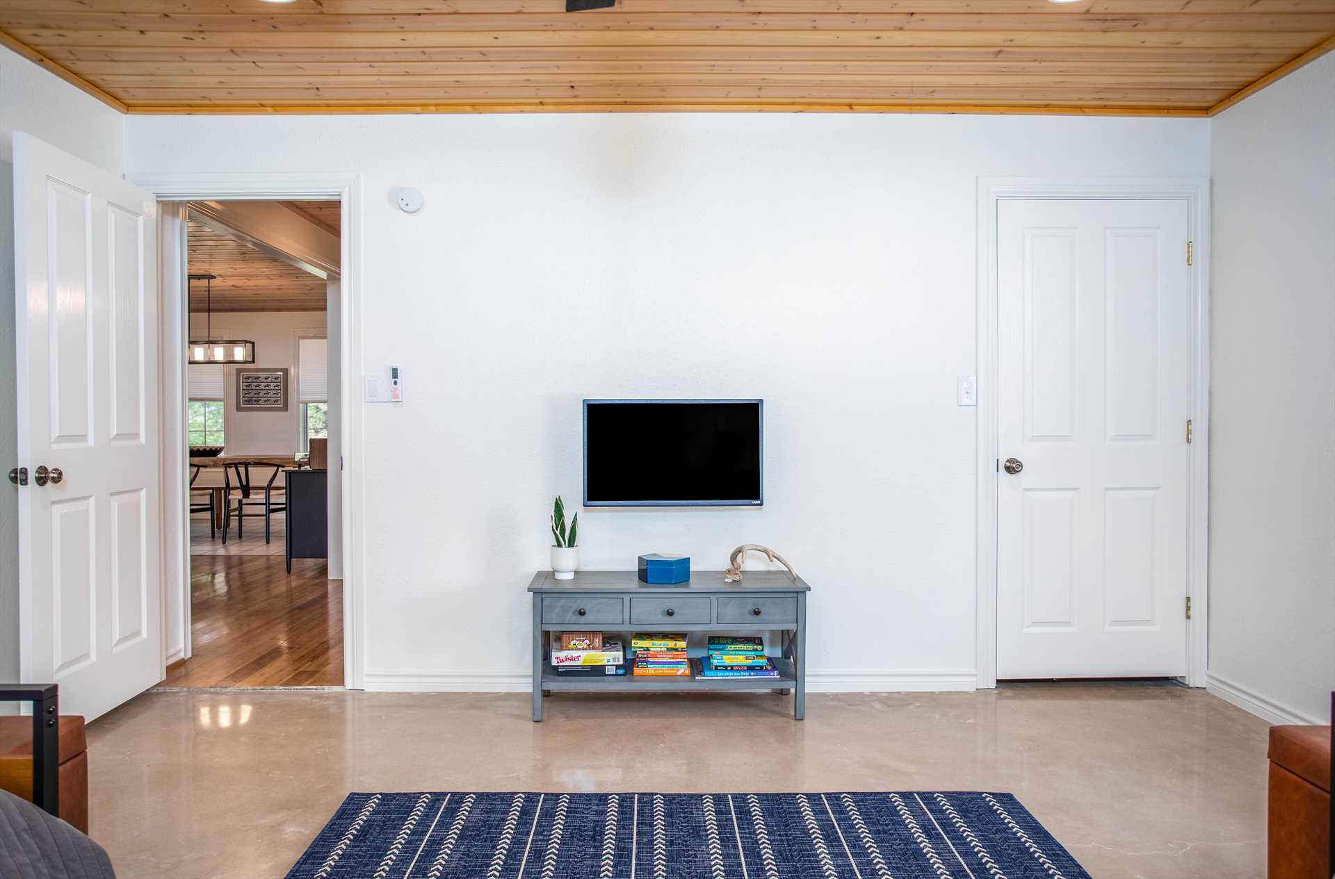                                                 You'll find three smart TVs in the Retreat, along with a fun collection of board games!