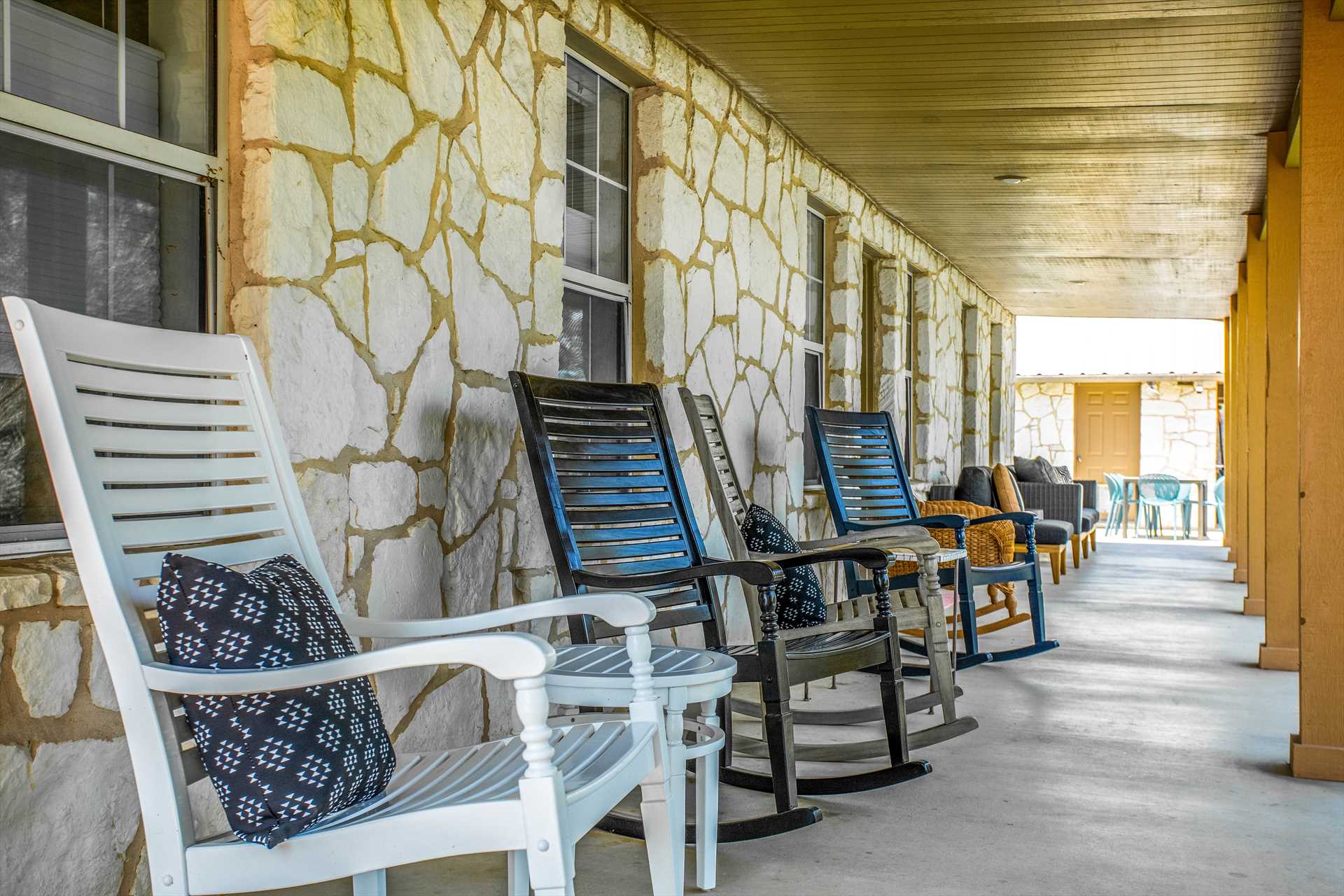                                                 Cool and soft comfort greets you on the shaded patio, complete with plush outdoor furniture.