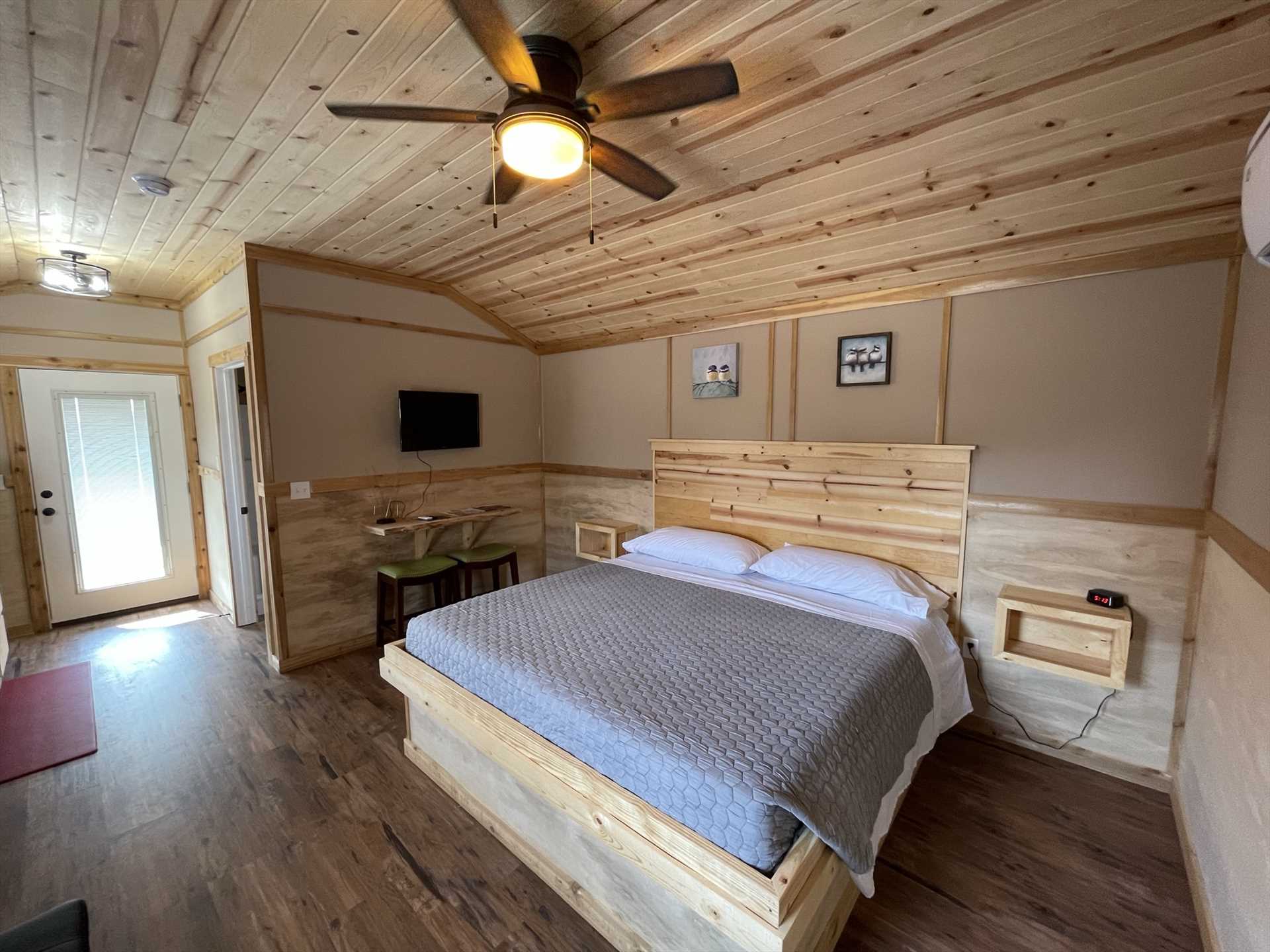                                                 You'll enjoy TV with local channels and Wifi service...and the whole cabin is kept comfy with AC, heat, and ceiling fans!